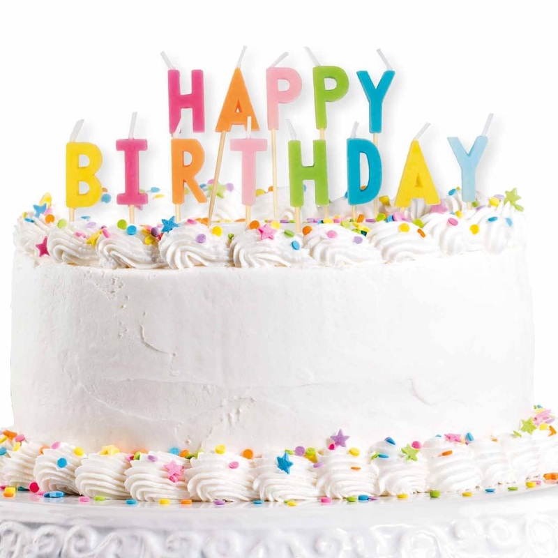 Colorful happy birthday cake candles lettering